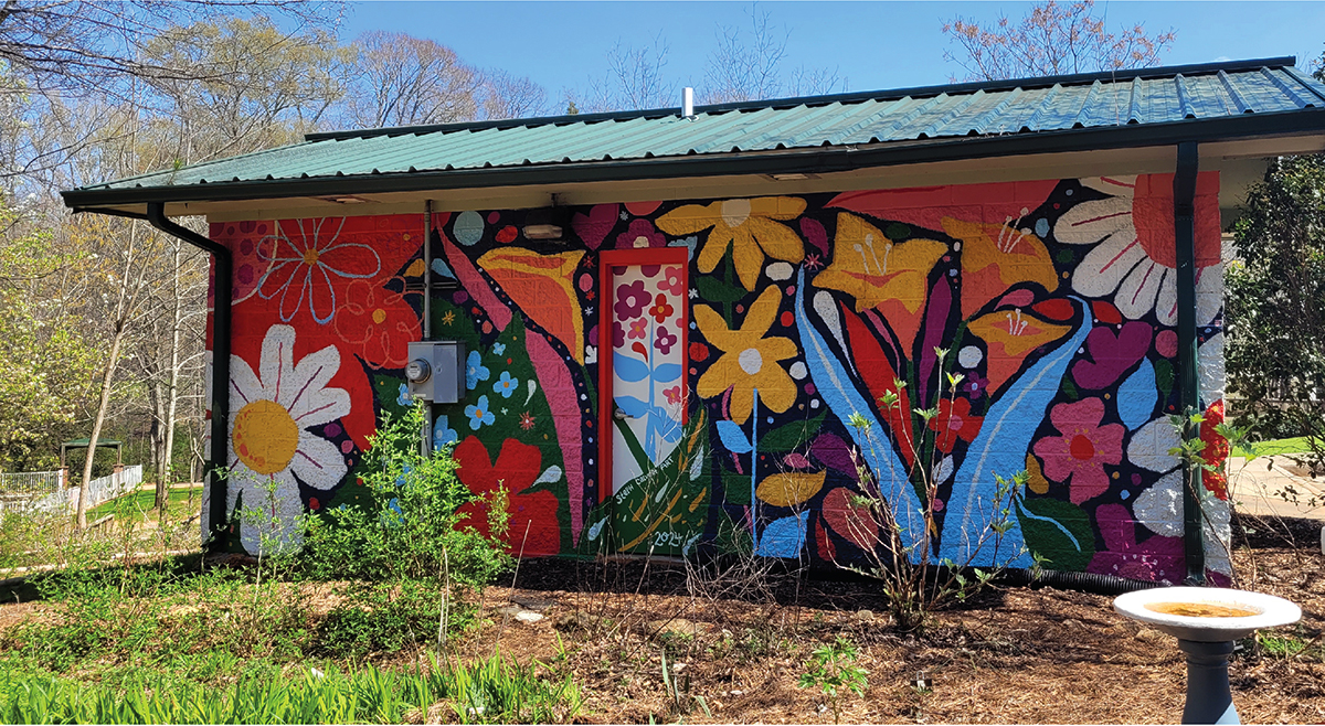 Hire a Mural Arist - "Floral Community" public art painting at Heritage Park, McDonough, Georgia by painter Steph Calvert Art